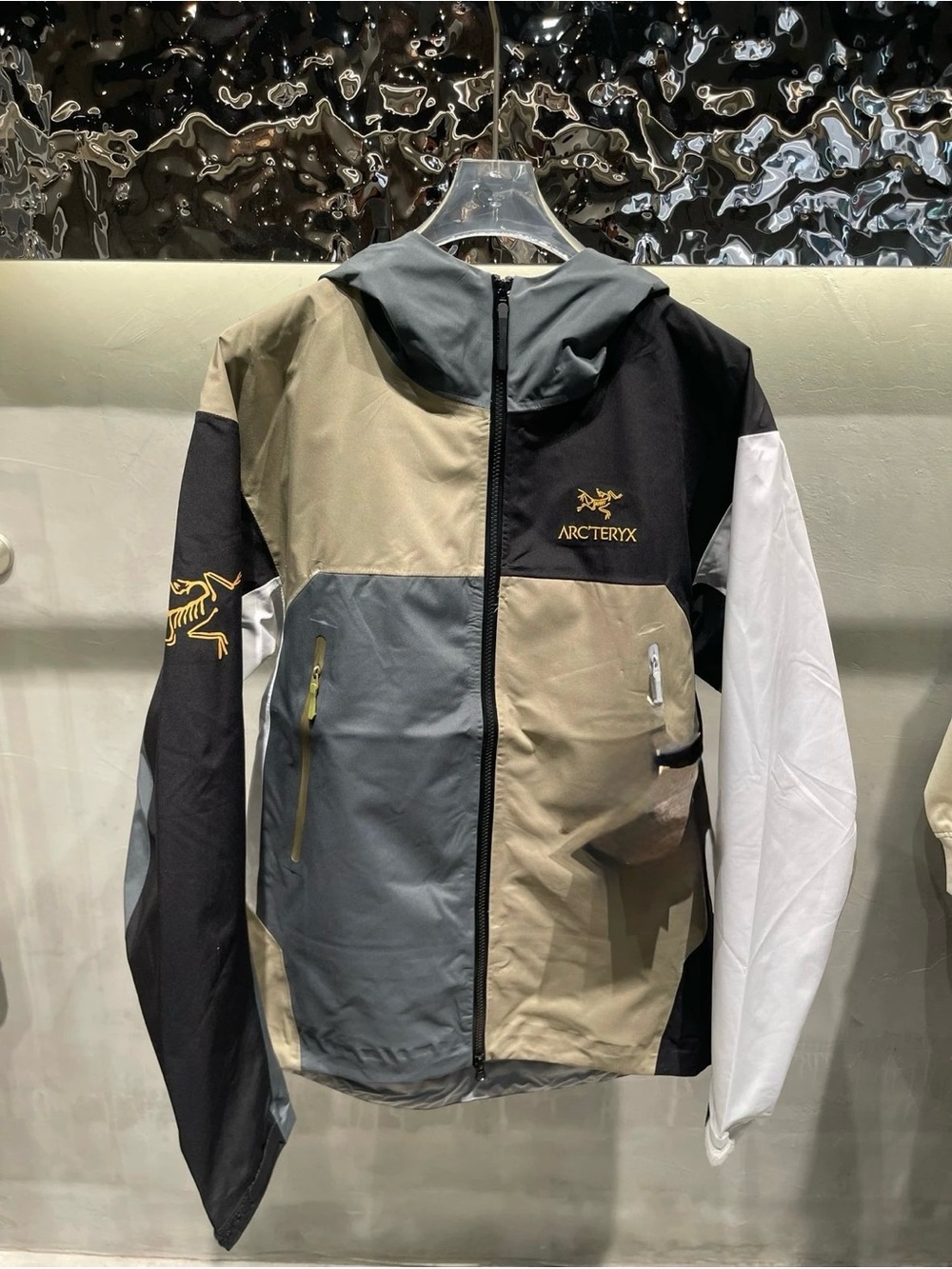 Arc'teryx Men's Multi-Panel Hooded Rain Jacket in Black, Gray, Tan & White